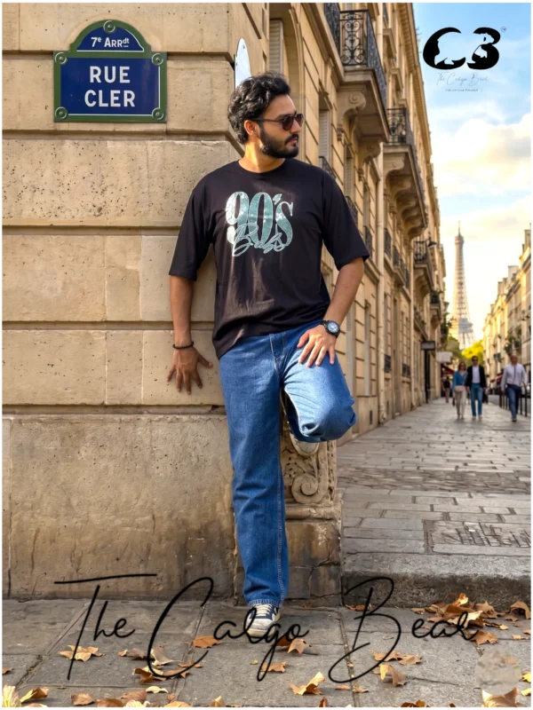 The Cargo Bear white 210 GSM cotton T-shirt with “90’s Babe” retro graphic print, styled in urban streetwear look