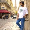 The Cargo Bear white 210 GSM cotton T-shirt with “90’s Babe” retro graphic print, styled in urban streetwear look